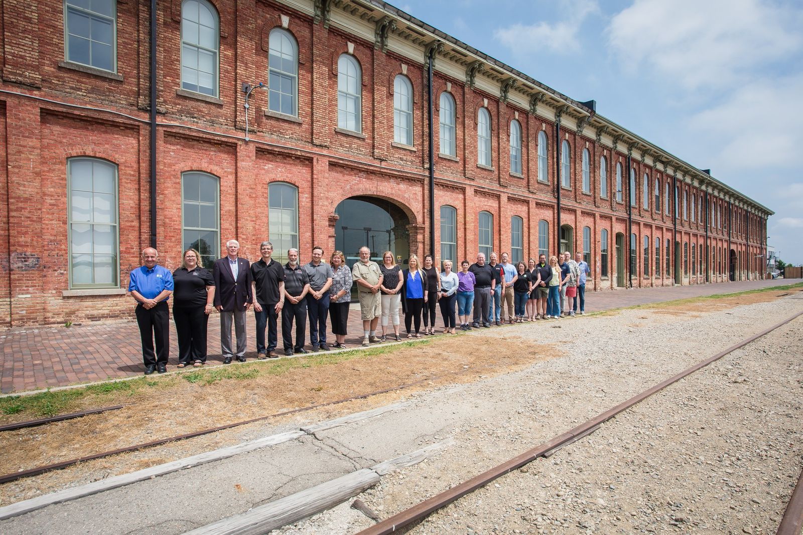 St. Thomas Executives Association members in front of the CASO Station